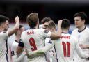 Harry Kane celebrates with his team-mates after scoring England's opening goal in Albania Pictures: FLORIAN ABAZAJ/PA