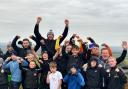 Youngsters from West Auckland Amateur Boxing Club celebrate  with Tyson Fury after reaching the fell top