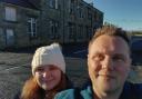 Sarah Denham and husband Ben in front of the building in Wolsingham