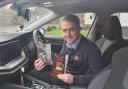 Keith with his new book - The Seekers of Duat - in his taxi