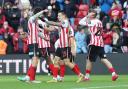 Nazariy Rusyn is congratulated in scoring in Sunderland's win over Preston