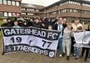 Gateshead FC fans protest outside the civic centre after their club was excluded from the National League play-offs.