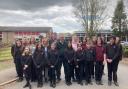 Pupils with MP Paul Howell and local councillors Lorraine Tostevin and Paul Walters outside Hurworth School