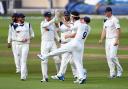 Yorkshire's Jack Brooks (centre, with head band) celebrates taking the wicket of Nottinghamshire's Alex Hales