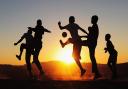 Children play football in Magaliesburg, South Africa