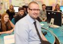 SCHEME: Michael Carrick, Newcastle IT Apprentice Hub trainer, with his students