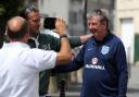Pressure off: England manager Roy Hodgson poses for photos with fans in Chantilly, France, after Thursday's victory over Wales. Picture: Owen Humphreys/PA Wire.