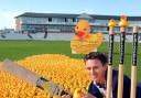 DUCK RUNNING: Durham County cricketer Gary Pratt in a sea of ducks at the Durham ground to launch the Grand Durham Duck race