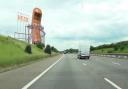 An artist's impression of the Sausage of the North sculpture from the A1(M) near Bedale