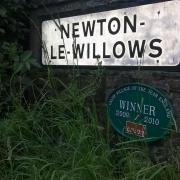 The Newton-le-Willows road sign