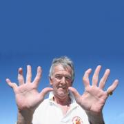 Backtrack - Wicketkeeper Dave Morrison shows his  twisted fingers .