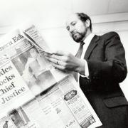 Peter Sands casts an eye over his broadsheet newspaper in January 1990