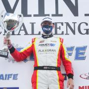 Max Coates celebrates after winning on the opening weekend of the Mini Challenge series (Picture: Jakob Ebrey)