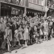 Were you among these wellwishers lining the streets on May 27, 1960, to welcome the Queen to the region? Get in touch if you recognise anyone or if you remember what you were doing that day