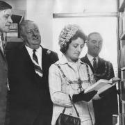 The opening of Cockerton library on September 2, 1970, with mayoress Doreen Jackson drawing the first book of the shelves while her husband Eric, the mayor, looks on behind her. On the far left is David Dougan of the Northern Arts Association, who
