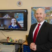 Hutton Rudby Primary School headteacher Matthew Kelly with year 5 pupil Izzy Stokes on a zoom chat