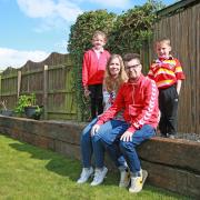 Simon Horner from Scotton was diagnosed with pancreatic cancer last year, Richmond Rugby club have volunteered and made over their garden for their two children Layla 9 and Henry 5  and wife Terri Picture: SARAH CALDECOTT