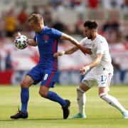 James Ward-Prowse holds off his opponent during England's win