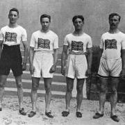 The team which won gold at the 1912 Olympic with Willie Applegarth, in his trademark button-up shorts, on the left. Mustachioed Vic is on the right