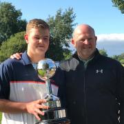 Jack and his dad, Stephen with the trophy