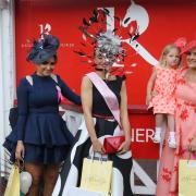 Best dressed winner of 2021, Lisa McArdle, with runner-up Isobelle Mason, and Amy Leng (and three-year-old Robyn) in third. Picture: Peter Barron