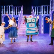 Alex Moran as Lumiere, Lucy Carne as Belle, Nick O'Connor as Dame Minnie Van-Clamper, and Ben Andrews as the Beast