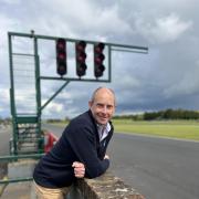 Ben Taylor, the CEO of BARC, looks out over the start and finish line at Croft Circuit, near Darlington