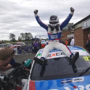 Dan Lloyd celebrates victory in the BTCC Championship. PICTURE: DAVID NELSON.