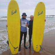 Me with my surfing instructor, Ollie