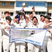Nottinghamshire’s Steven Mullaney (centre) celebrates with the trophy with team-mates after winning the Division Two title