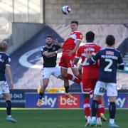 Boro defender Dael Fry challenges for a header against Millwall