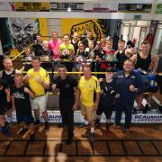 Former champion Robin Reid pictured, front centre, during a previous visit to train and inspire members of West Auckland Amateur Boxing Club