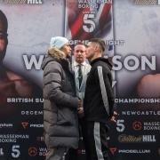 Troy Williamson and Josh Kelly face off, watched by promoter Kalle Sauerland