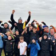 Youngsters from West Auckland Amateur Boxing Club celebrate  with Tyson Fury after reaching the fell top