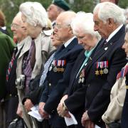 LEST WE FORGET: The remaining veterans take part in a silent tribute during the ceremony.