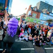 Penni T in front of crowd at Middlesbrough Pride.