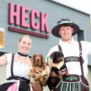 HECK team members with their best dressed sausage dogs.