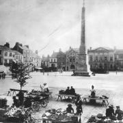 Ripon Market Place, probably in the 1880s, when it was flagged with very neat diamond stones. Behind is John Aislabie's obelisk