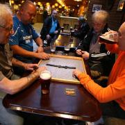 SPOT PRIZE: Dominoes players at Hogan's Bar, Victoria Road, Darlington. From left, Peter Hammond, Dave Briggs, Iain Bright and Barry Smith.