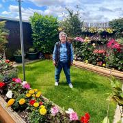 Alma Gardiner in her award-winning garden