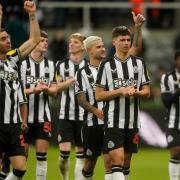 Newcastle players celebrate the win over Chelsea