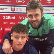 Middlesbrough youngster Law McCabe with head coach Michael Carrick