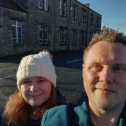 Sarah Denham and husband Ben in front of the building in Wolsingham
