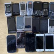 The mobile phones that were recovered from the back of our garage