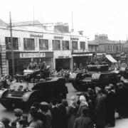 Minories garage on the west side of Northgate when a Victory parade was passing on June 10, 1946 - but when was Goering's captured car on display here. On the right elevation of the garage can be seen its petrol canopy which enabled fuel to be pumped
