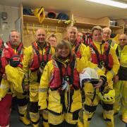 Before launching Scarborough's Shannon lifeboat The Rev Canon Kate Bottley donned RNLI crew kit in the dry room.