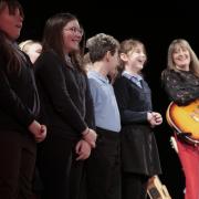 Elaine Palmer performing with children from Acre Rigg Academy at The Lubetkin Theatre, East Durham College at a concert in January.