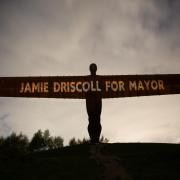 A Jamie Driscoll campaign message projected onto the Angel of the North by the Green New Deal Rising group