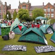 Students at an encampment on the grounds of Newcastle University, protesting against the war in Gaza.