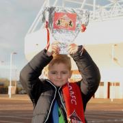 Kieron Davis, five, among the excited Sunderland fans who arrived early at The Stadium of Light this morning (Sat) as they set off on the long road to Wembley ahead of tomorrow's Capital One Cup final against Manchester City.